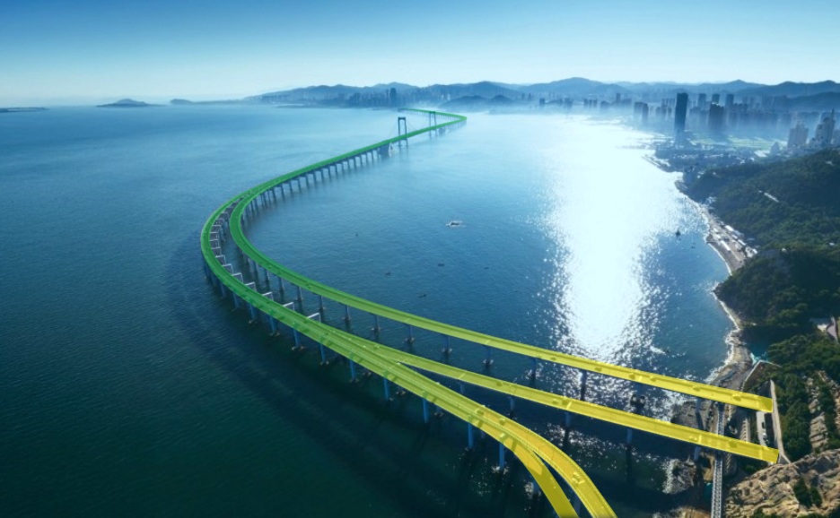 A long, curved bridge over the ocean.