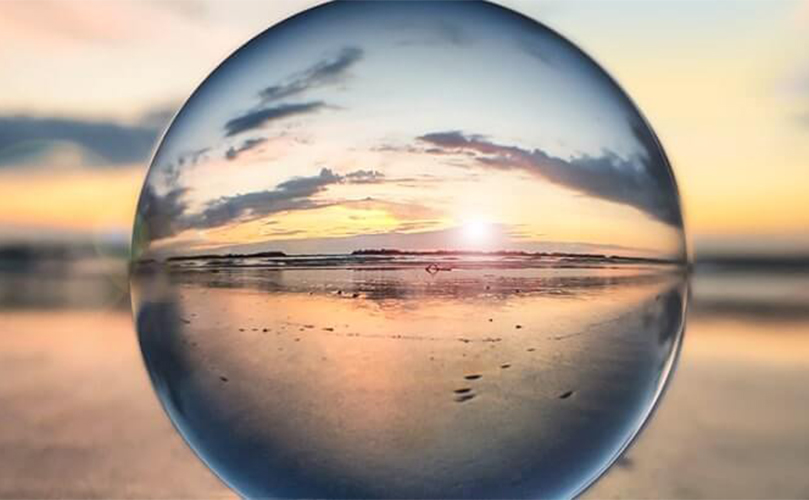 Seen through a crystal ball on the serene evening seaside